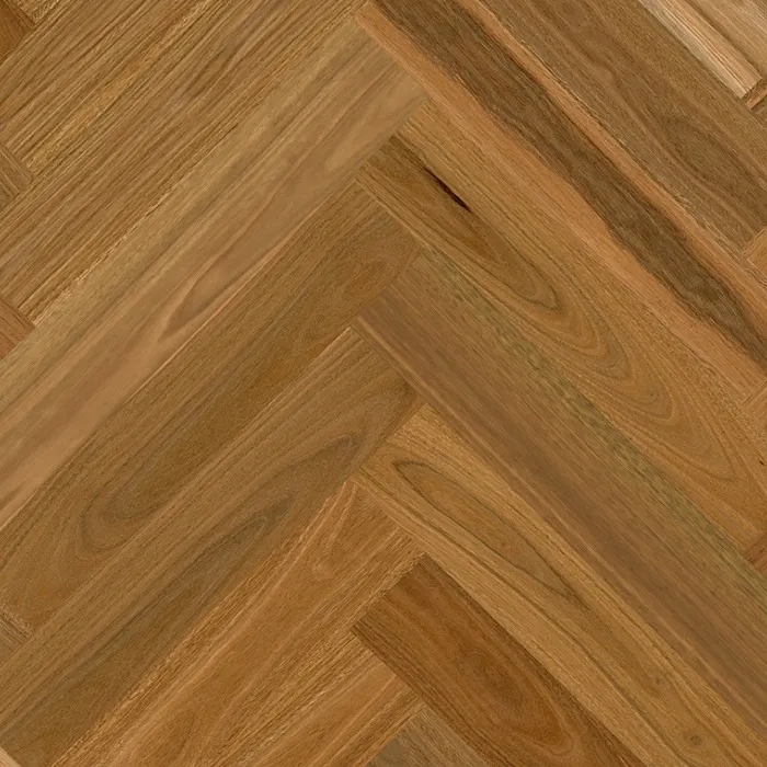 Spotted Gum timber flooring in herringbone pattern, suitable for residential spaces, showcasing natural color variations and rustic beauty.