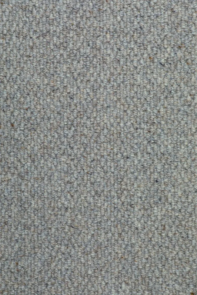 Textured loop carpet in 'Tavern' color, showcasing rustic charm and premium wool quality, ideal for high-traffic areas.