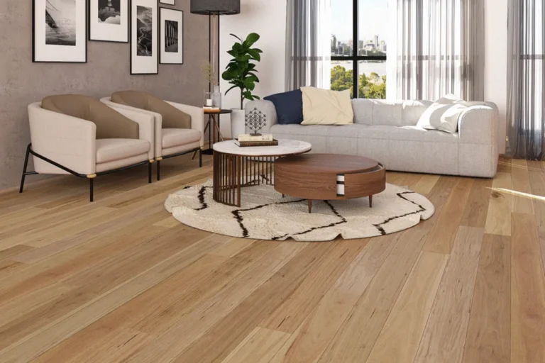 Living room featuring timber flooring, modern furniture, and natural light, showcasing the durability and aesthetic appeal of wood flooring in a stylish setting.