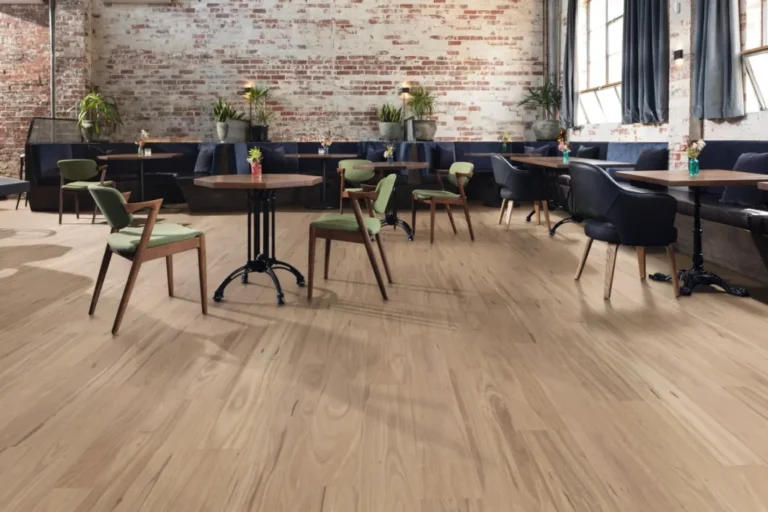 Vinyl flooring in a modern dining area with wooden tables and green chairs