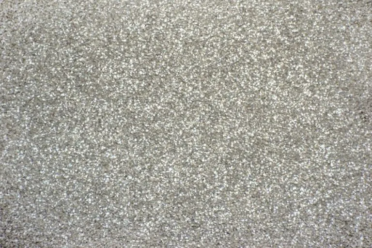 Soft cut pile North Eden carpet in a light, neutral tone, designed for residential spaces, emphasizing comfort and stain protection.