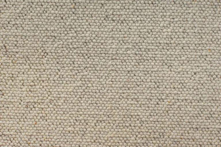 Country Road carpet swatch in a soft, neutral tone, showcasing a textured weave, ideal for residential spaces focused on comfort and style.