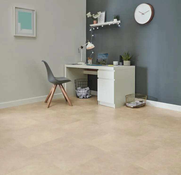 Maine color Loose Lay Originals Tiles in a modern study setting with a desk, chair, and decorative elements, showcasing the stylish and durable vinyl flooring option from Royal Floors.