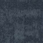 Dark blue textured carpet tile from the Nova collection, showcasing modern design suitable for contemporary offices and urban spaces.