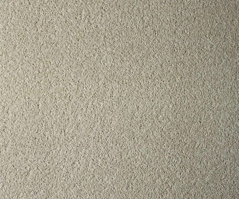 Textured beige flooring sample from the York Cliffs collection, designed for durability and stain resistance, reflecting coastal aesthetic and luxury suitable for families.
