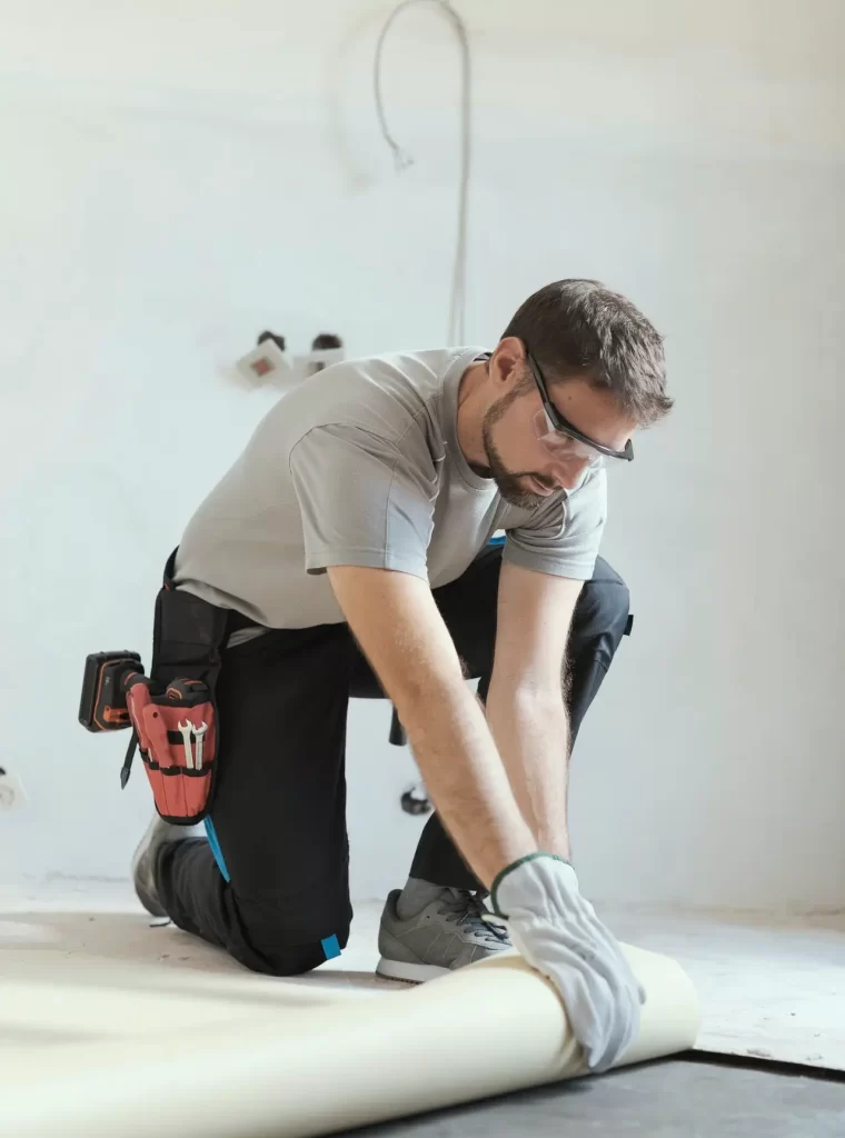 contractor-removing-an-old-linoleum-flooring.jpg